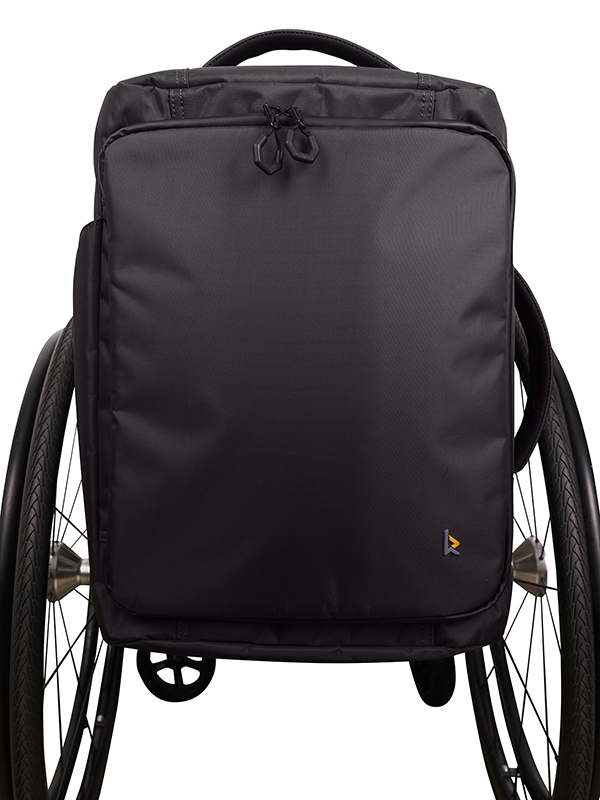 Backrest travel pack on wheelchair
